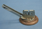 knife sharpener on wooden base